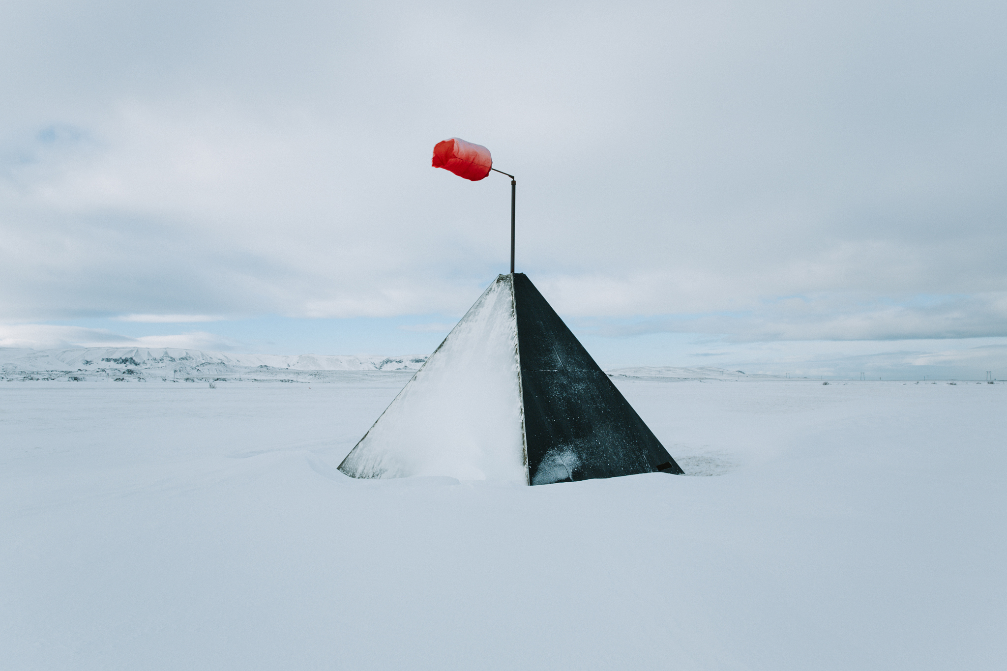 Snowed in airstrip marker near Hafnarfjörður