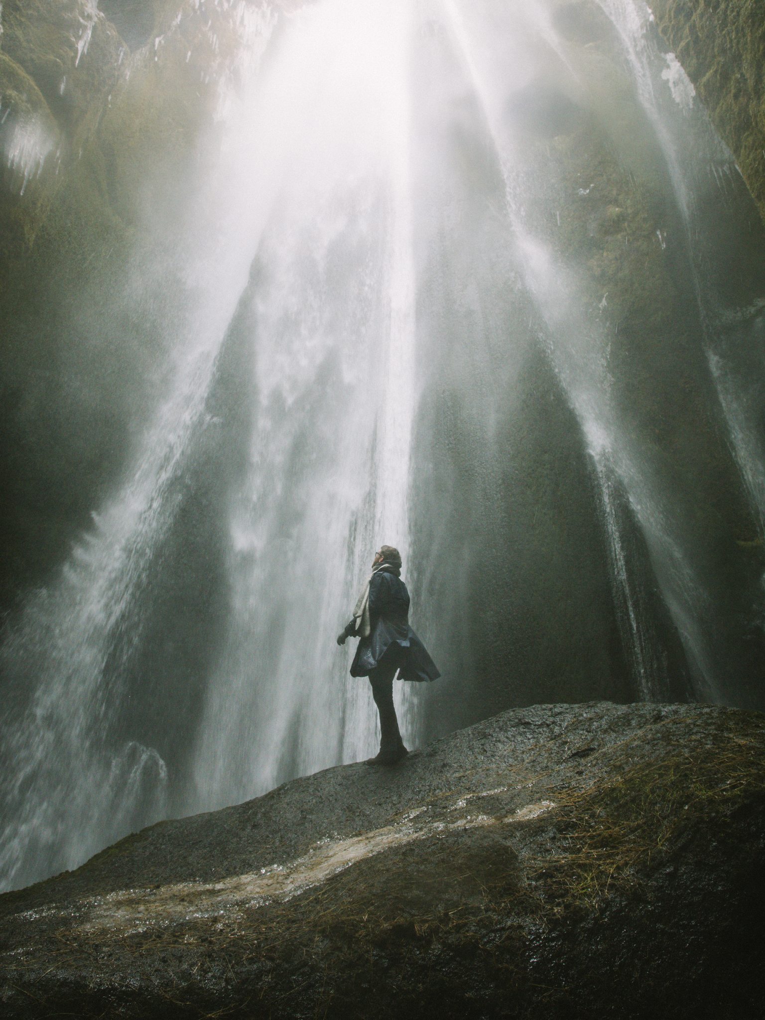 John in Gljúfrabúi waterfall cave
