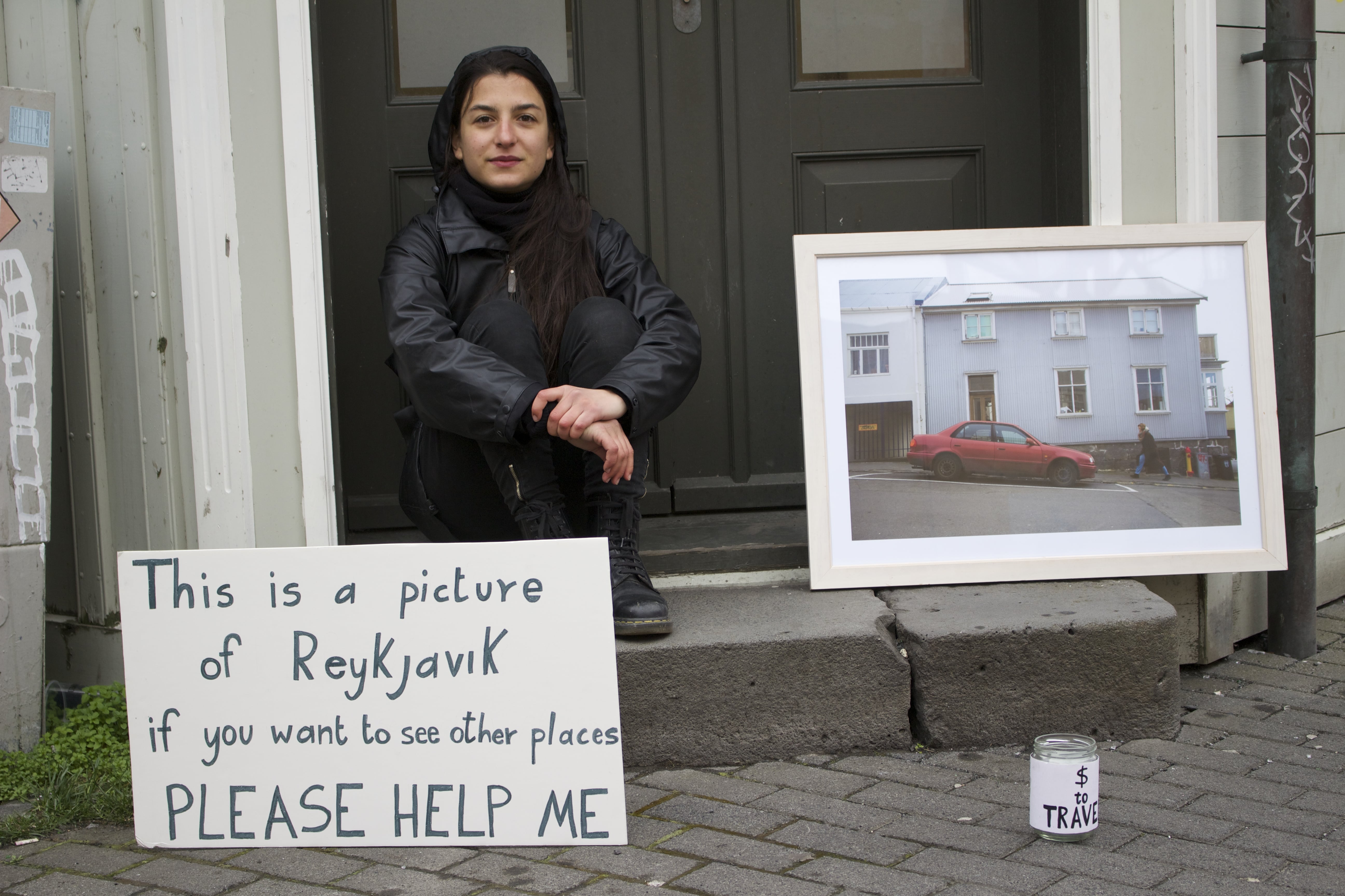 Street Artist Asks Passersby For “Money To Travel”