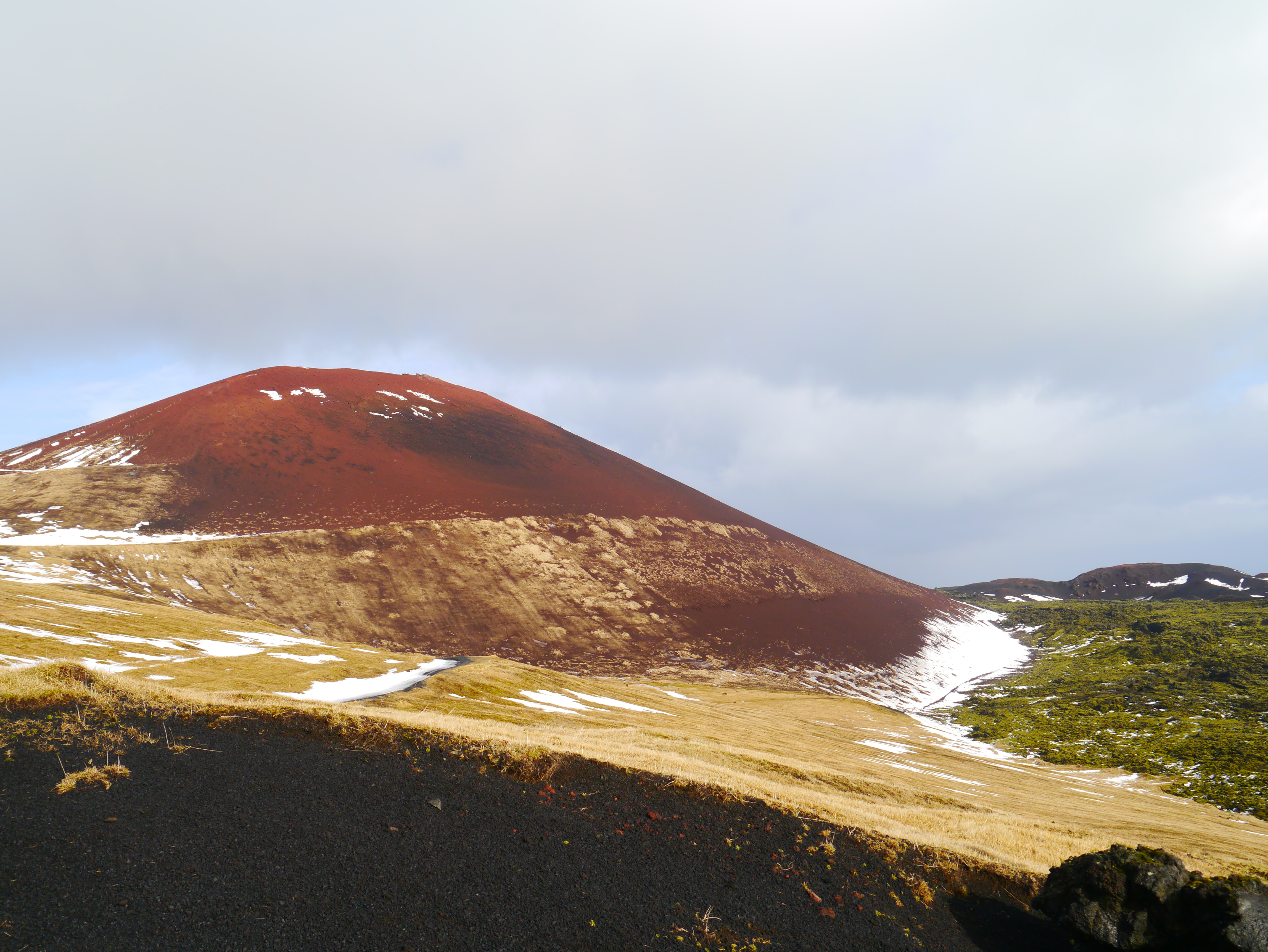 Exploring A Small Volcanic Island Off The Coast Of A Slightly Larger Volcanic Island